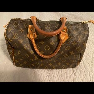 Louis Vuitton Speedy bag.